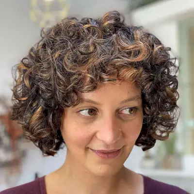 Short Curly Rezo Cut Bob Style for women with thick curls and a longer face