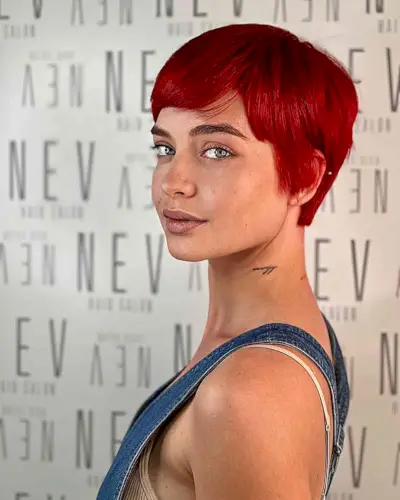 Feminine Fiery Red Pixie with Soft Layers