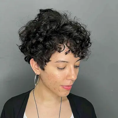 Voluminous Curly Pixie Hairstyle for Thick Hair