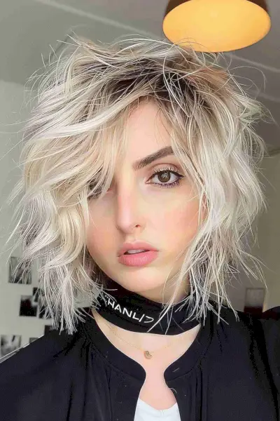 A shattered and unstructured bob for wavy hair for thick hair