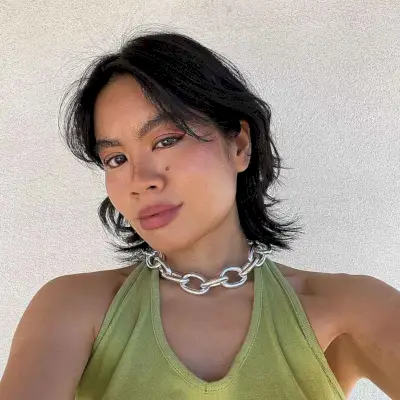 Short Wolf Cut with Layers and a Middle Part