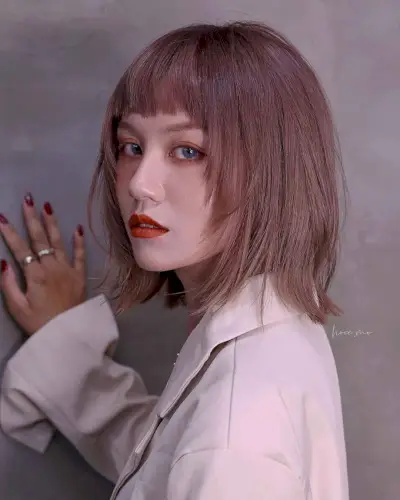 Neck-Length Wolf Cut with Short Bangs