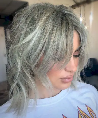 Short Wavy Wolf Haircut with Curtain Bangs