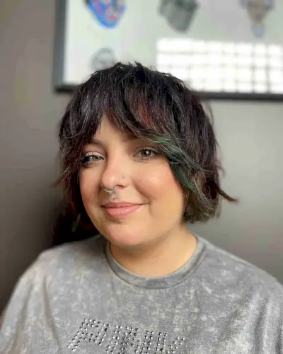 Shaggy Bob with Face-Framing Layers and Bangs for Chubby Faces