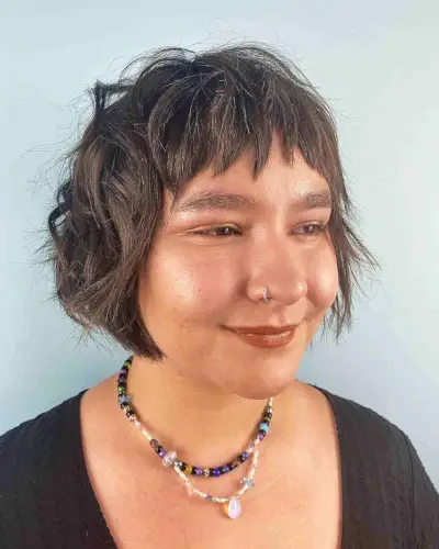Messy Textured Bob with Piece-y Bangs for Chubby Faces