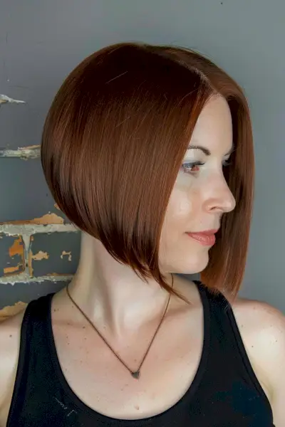 Short graduated bob with a center part for straight hair.