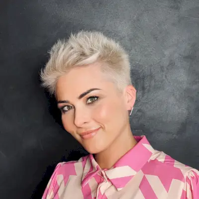 Very short pixie cut with blonde hair