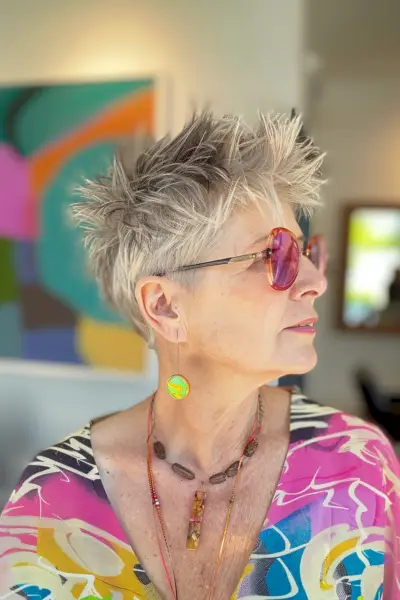 Woman with Short Feathered Salt-and-Pepper Spiky Pixie Cut