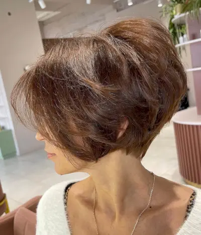 tousled brunette pixie bob