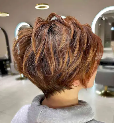 Messy Dark Copper Pixie Bob with Layers and a Tapered Nape