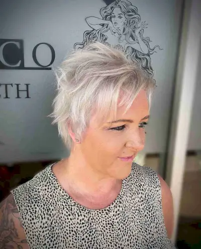 Icy Blonde Thin Pixie with Tousled Piece-y Layers