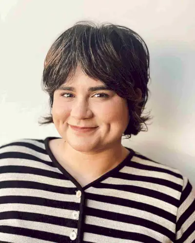 Adorable Short Cut with Curtain Bangs for Round Face Shapes 