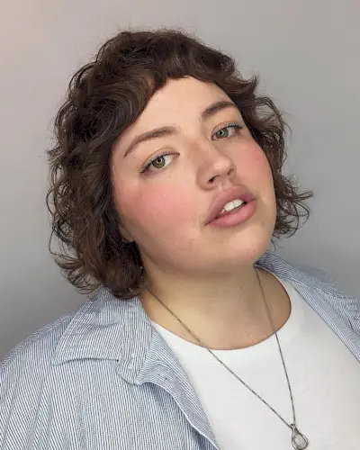 The fun Shaggy Bob Haircut on a girl with a rounded face shape