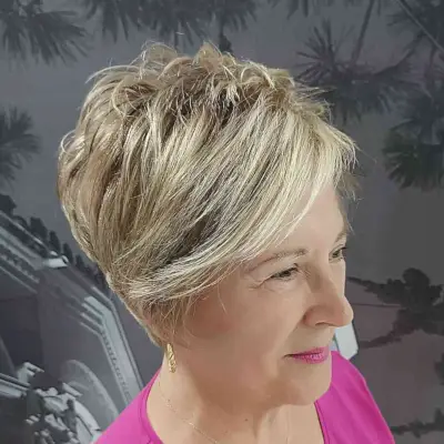 Textured Side-Swept Pixie with Visible Layers for older women with short hair