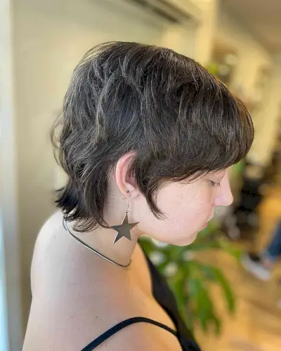 Dark Brown Razor Cut Pixie with Shorter Layers and Soft Bangs