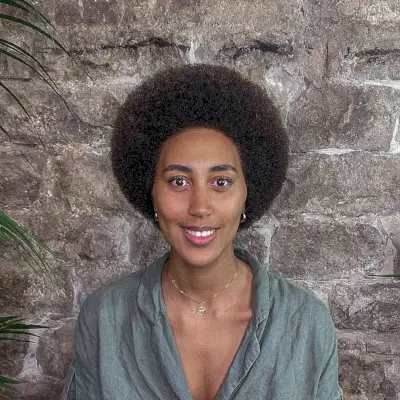 Short Dark Brunette Round Afro Hair on Black Women