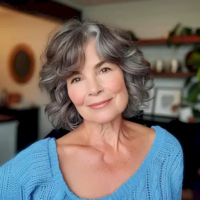 Face-Framing Curtain Bangs for Women Over 60 with short wavy hair