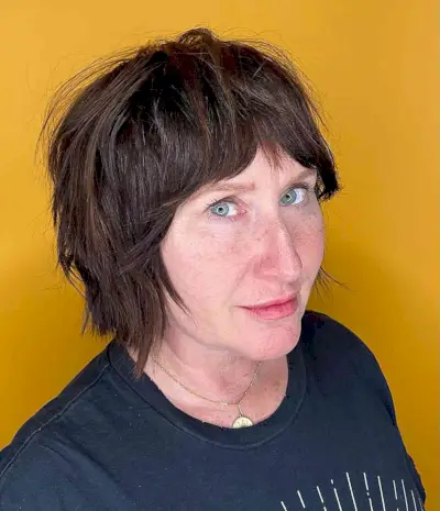 Jaw-Length Short Textured Bob with Shaggy Layers and Bangs for Older women