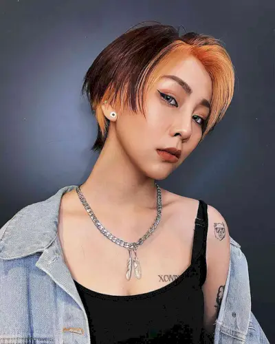 Ear-Length Edgy Pixie Mullet with an Orange Money Piece