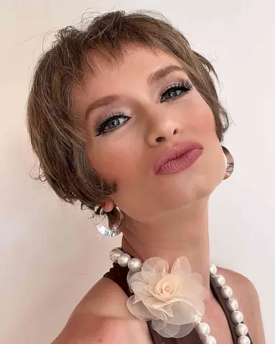 Ear-Length French-Inspired Bixie Cut for women with square jawlines