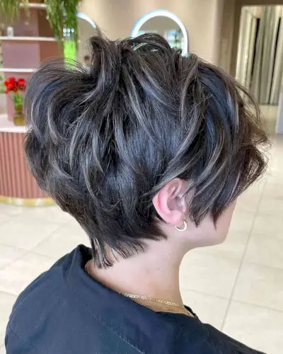 Voluminous Pixie with Feathered Layers for Fluffy Hair