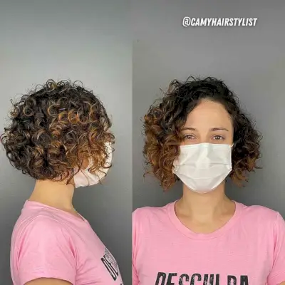 Chin-Length Curly Hair with a Side Part and Layers