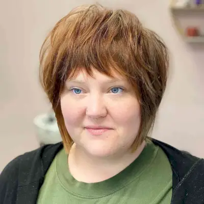 Chin-Length Shaggy Bob with Layers for Round Faces