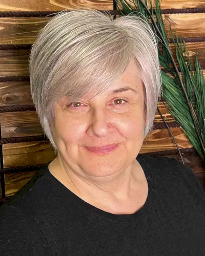 Deep Side Part Long Pixie Cut with Fringe on Older Women with Round Faces