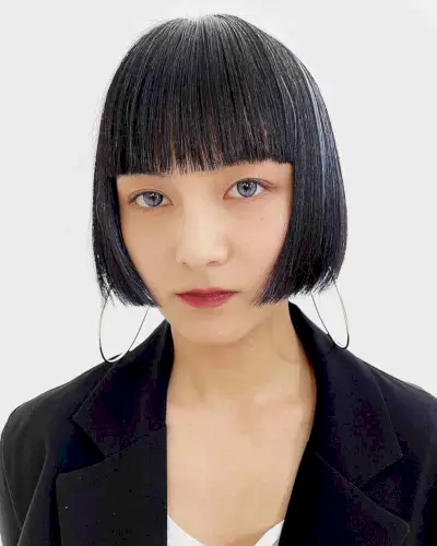Disconnected One-Length Bob with Full Bangs at the Jawline