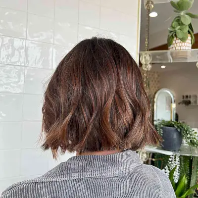 Full Balayage Short Bob with Auburn Tones
