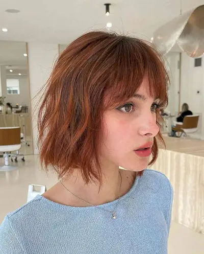 Electric Bronze Choppy Bob for women with short messy hair and fringe