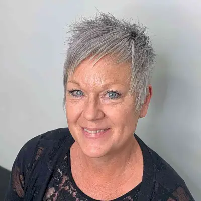 Short Spiky Choppy Pixie with Asymmetrical Bangs on Thin-Haired Ladies Over 50