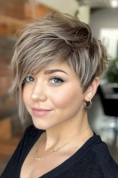 short layered hair cut with long side bangs