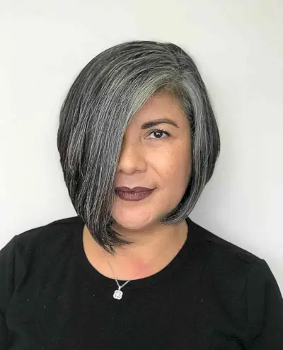 Short Asymmetrical Bob with Side-Swept Bangs for Women