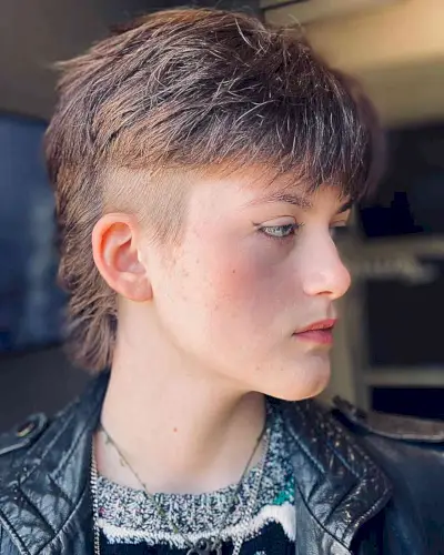 Undercut 90s-Inspired Mullet with Bangs for Women with an edgy style