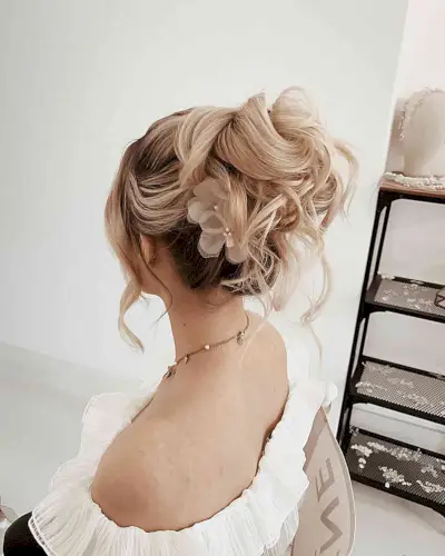 Soft Blonde High Bun Loose Updo