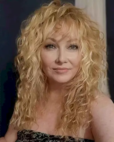 80s-Inspired Medium Beach Perms with Light Bangs