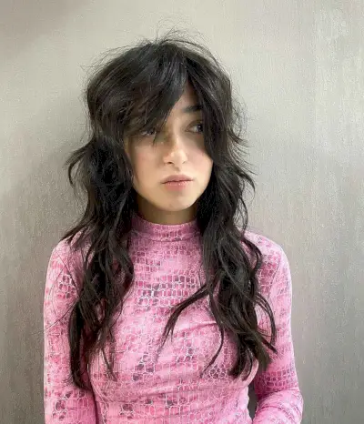 Long Wolf Cut with Side-Parted Curtain Bangs