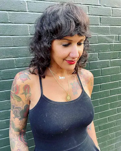 Thick Wavy Shag with Bottleneck Fringe on short hair