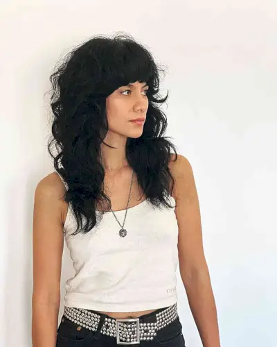 Black Shaggy Cut with Natural Waves for women with mid to long length hair