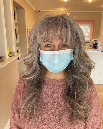 Wavy Long Gray Shag with Wispy Bangs for Women Over 60