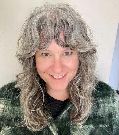 Wavy Shag for Women Over 50 with Silver Hair