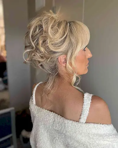 Voluminous High Updo for Mother of the Bride