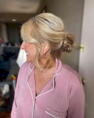 Grooms Mom Soft Messy Bun with Face-Framing Layers