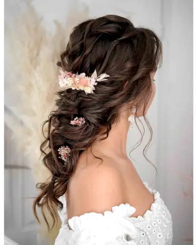 Stunning Messy Braid with Flowers for a Wedding