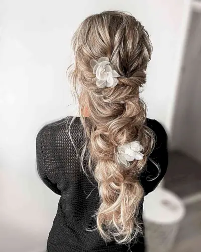 Romantic and Dreamy Boho Hair with flowers for a bridesmaid