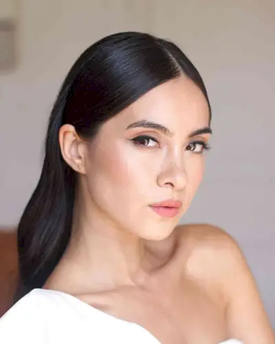 Sleek and Straight Middle Part Hair Perfect for Wedding Guests