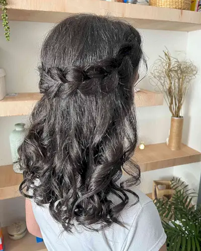 Mid-length Wavy Half-Up Dutch Crown Braid for wedding guests
