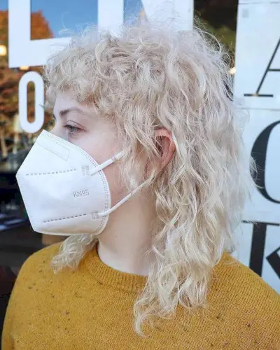 Shoulder-Length Wolf Cut Mullet with Loose Curls