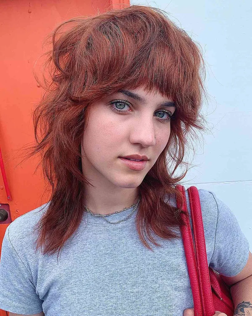 Mulet coupé au loup avec une grosse frange' title=